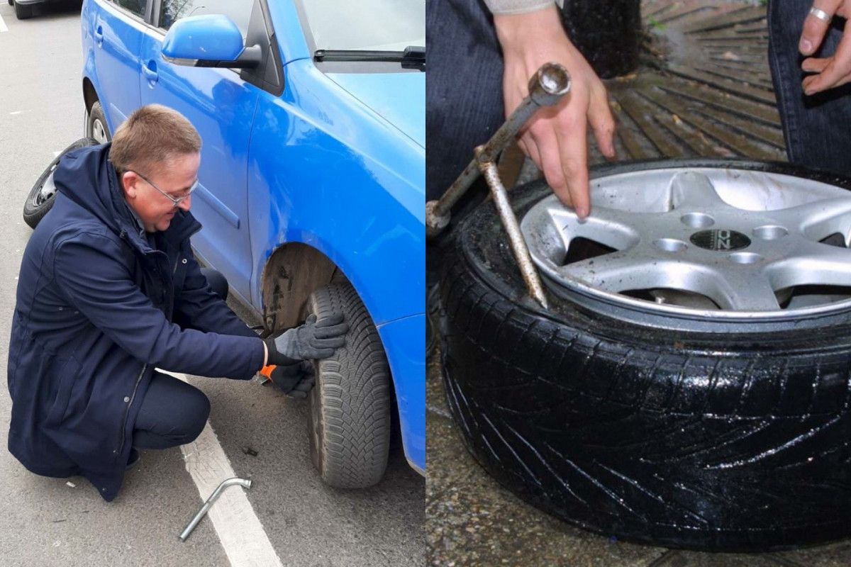 Meras Šarūnas Vaitkus keičia automobilio ratą