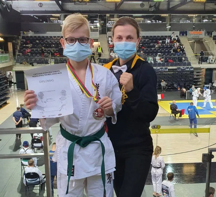 Nojus Trukšanovas ir trenerė Kristina Basova